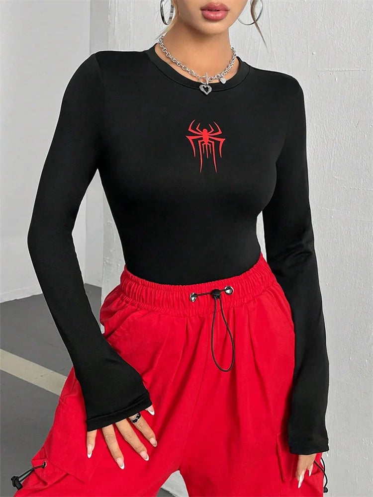 Vagabane Arachnita cropped gym top with spider graphic — side view